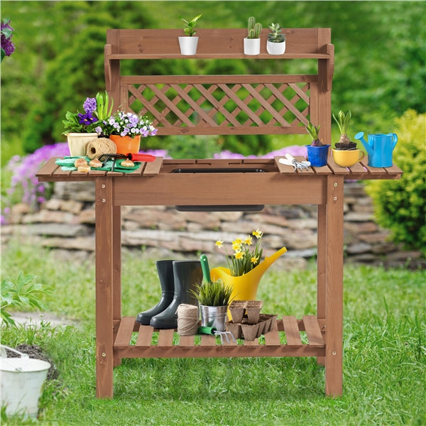 Banc de rempotage en bois de sapin avec plateau coulissant et roues verrouillables Jihane, Brun