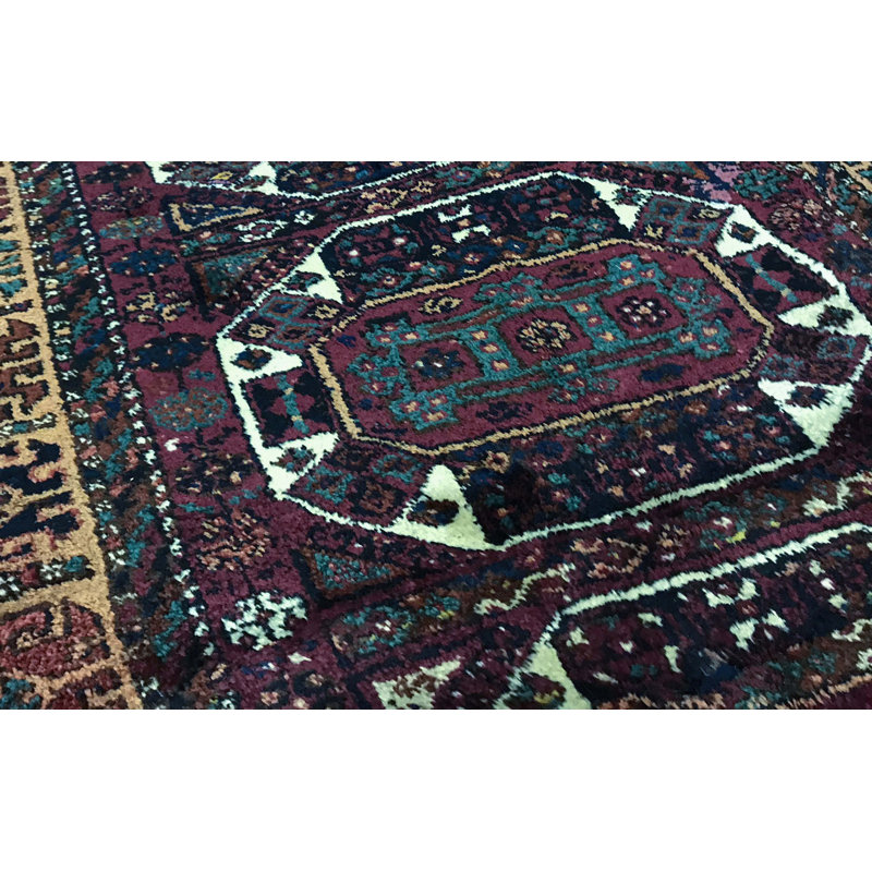 Tapis vin et or noué à la main de haute qualité