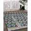Tapis géométrique jaune / bleu ciel / vert Rines-165486287