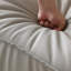 Causeuse-coussin modulable en cuir véritable gris