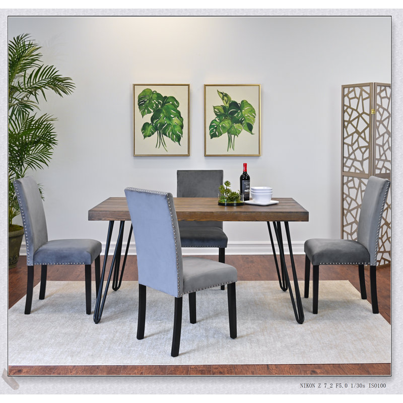 Ensemble repas 5 pièces avec pieds en épingle Ashzo, élégant et confortable pour les maisons modernes et les petits espaces
