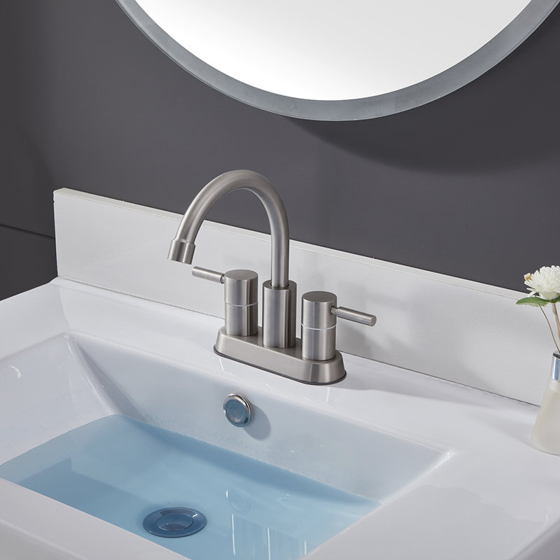 Robinet de salle de bain central à 2 poignées avec bonde