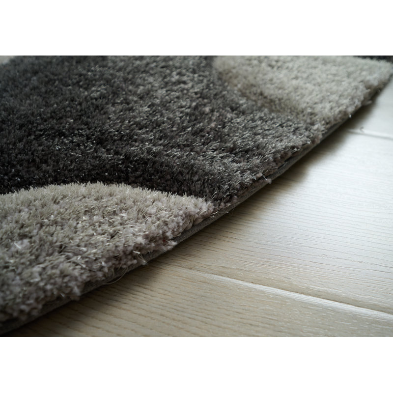 Tapis noir Jakelyn, Rond 7 pi