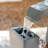 XBrand 38" Tall Metal Sculptural Multi-Tier Flower Water Fountain in Gray and Bronze