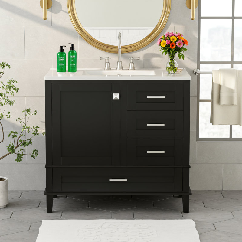 Meuble-lavabo noir de 36 po avec une porte à fermeture douce et trois tiroirs (profond, peu profond et long). Unité de rangement moderne.