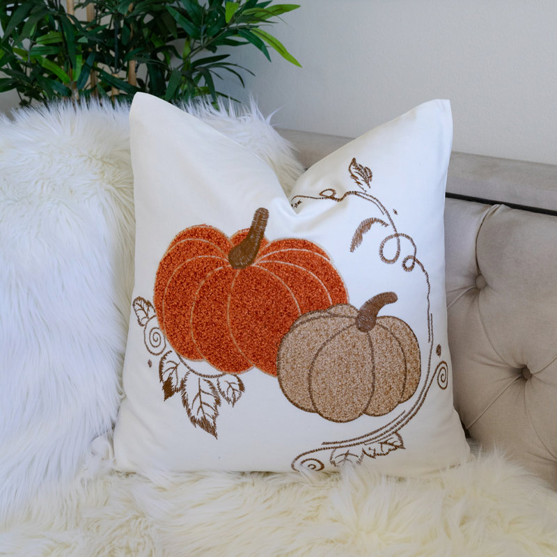 Coussin en coton citrouille brodé