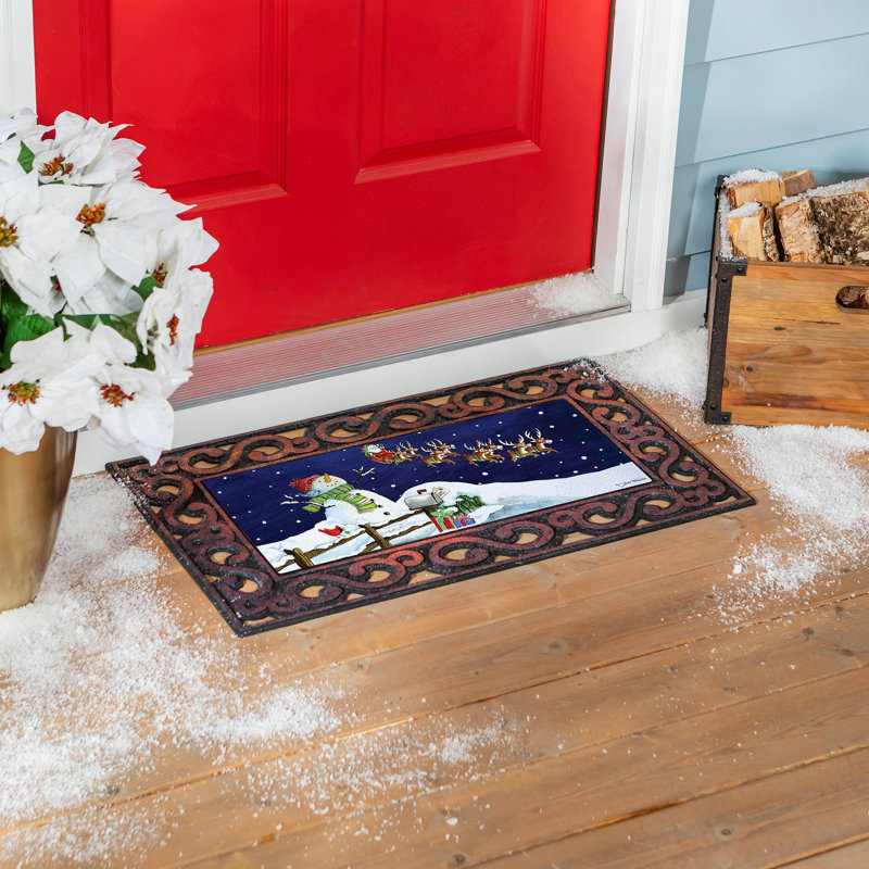 Tapis de père Noël et bonhomme de neige Sassafras