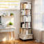 Étagère pivotante à 6 niveaux, blanc chaud, avec roulettes, tiroir et cloison, idéale pour la maison, le bureau ou la chambre. Design modulaire et polyvalent. Convient également au salon et au bureau.