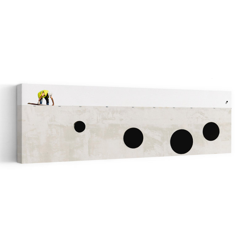 Worker On Concrete Wall by Joao Castro - Wrapped Canvas Panoramic Print, 30.48 cm H x 91.44 cm W