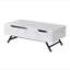 Table basse blanche avec plateau relevable