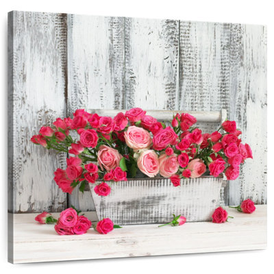 Harnek roses dans une boîte en bois