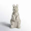 Statue de lapin debout glacé