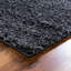 Tapis à poils longs en polypropylène tissé à la machine de couleur unie gris Fragos-576812713
