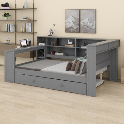 Lit plateforme en bois avec tablettes de rangement, lit gigogne, station de charge, DEL, bureau et tête de lit tapissier