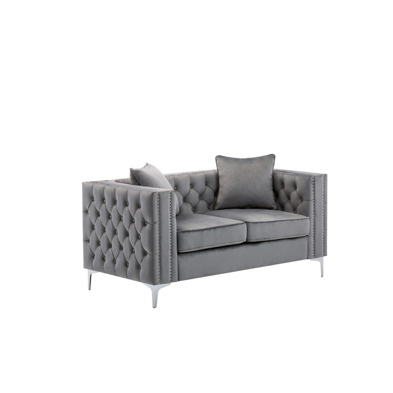 Comfortable Velvet Loveseat With Nailhead Trim And Button Tufting, Ideal For Relaxing And Entertaining.