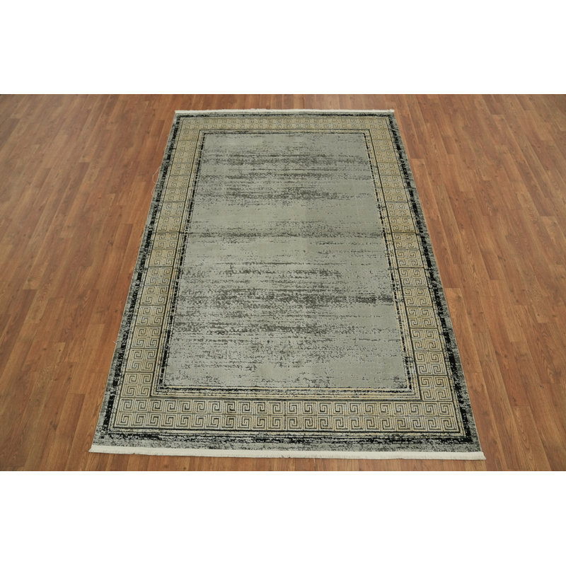 Tapis vert et gris aux tons neutres 5 x 8