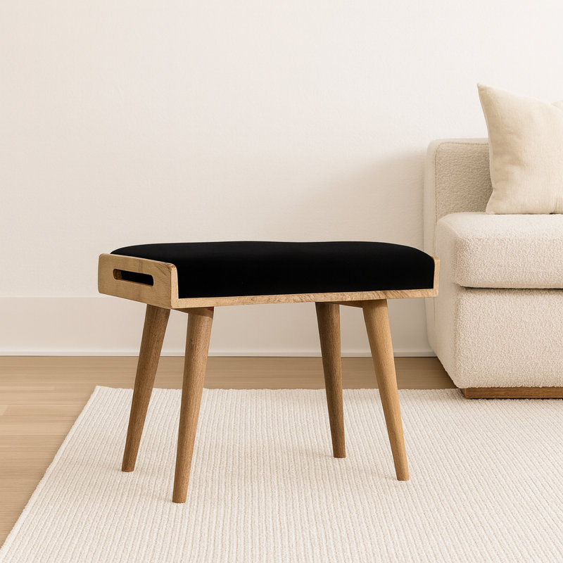 Repose-pieds noir en velours