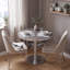 Table de salle à manger ronde à piédestal en pierre frittée avec base en acier inoxydable-525027693