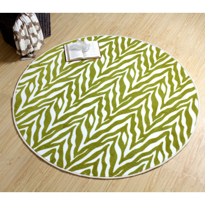 Tapis vert / beige à imprimé animal