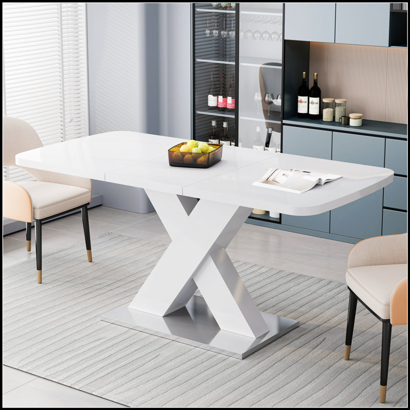 Table de salle à manger moderne carrée, extensible avec plateau blanc et pieds en MDF en X sur base en métal