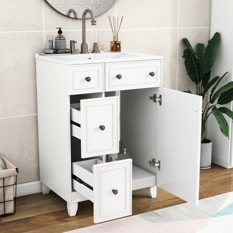 Meuble-lavabo de 24 pouces. Évier en céramique. Espace et espace. 2 tiroirs, 1 porte. Finition blanche. Meuble-lavabo de 24 po facile à nettoyer. Économie d'espace. Tiroirs et fabrication.