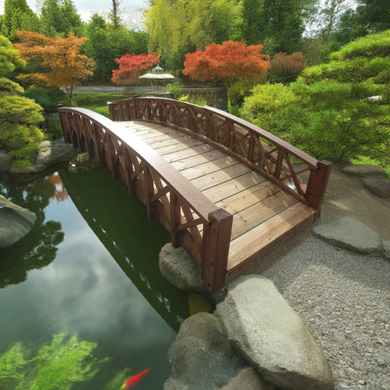 Gracefully Arched Wooden Garden Bridge with Lattice Railing