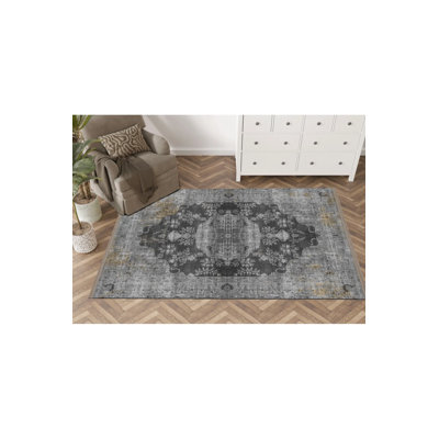 Tapis décoratif gris à motifs traditionnels