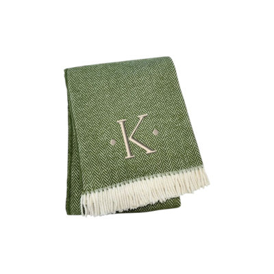 Jeté K 55 po x 70 po à motif de chevrons en mélange de coton vert et blanc avec pompons et broderies