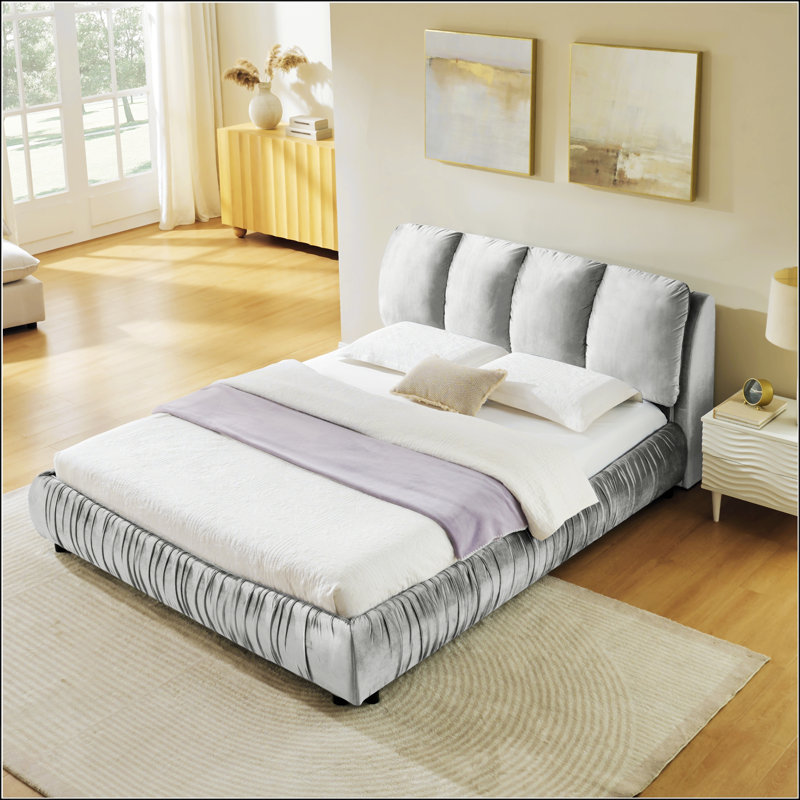 Structure de lit grand format avec tête de lit éponge moelleuse, velours brillant et pieds robustes pour les chambres à coucher modernes