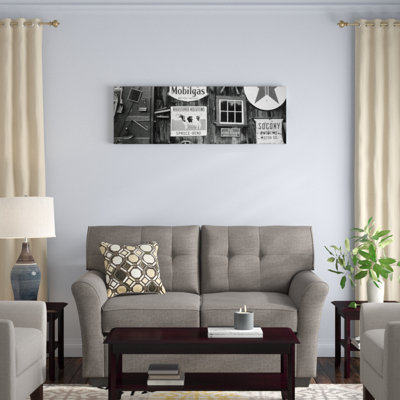 Vintage Americana On The Exterior Of An Old Building by Walter Bibikow - Unframed Photograph on Canvas