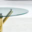 Table de salle à manger ronde moderne en verre avec base en métal doré