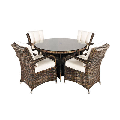 Harpenden 4 - Person Wicker Patio Dining Set with Round Table , Cushions Included