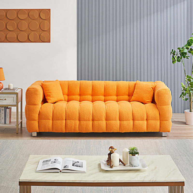 Élégant canapé avec deux coussins décoratifs, canapé de salon
