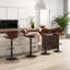 Annilee Swivel Upholstered Adjustable Height Bar Stool