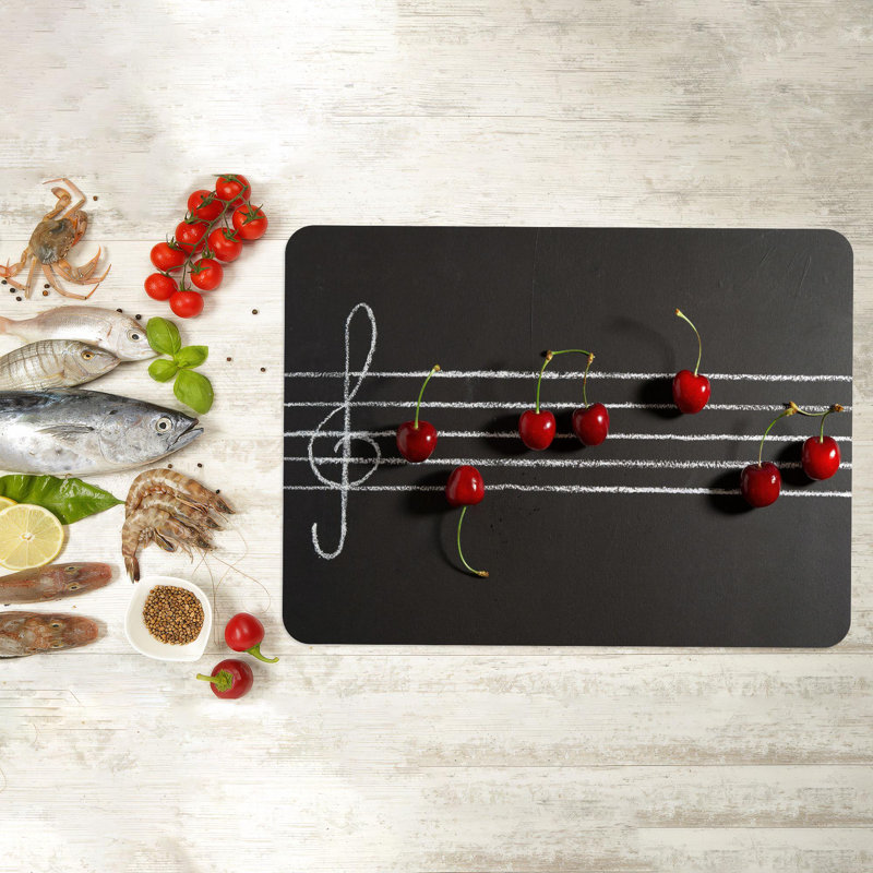 Conception de notes de musique sur un plateau de service en verre d'aspect cerise, idéal pour les amateurs de musique qui apprécient les ustensiles de cuisine artistiques