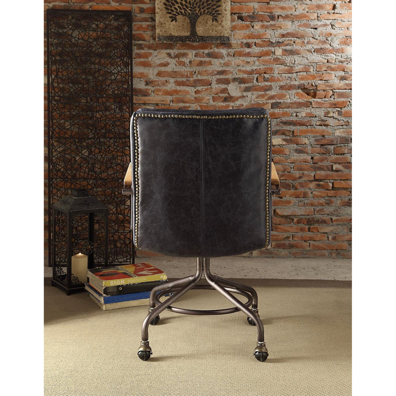 Chaise rétro sophistiquée bleue avec fonction pivotante et soutien des accoudoirs