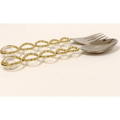 Service à salade avec boucle dorée et boule transparente