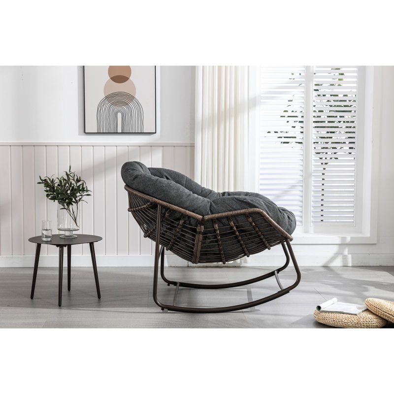 Fauteuil inclinable gris avec chaise berçante