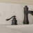 Deluge Waterfall Matte Black Widespread 3-Hole, 2-Handle Bathroom Sink Faucet With Drain Assembly