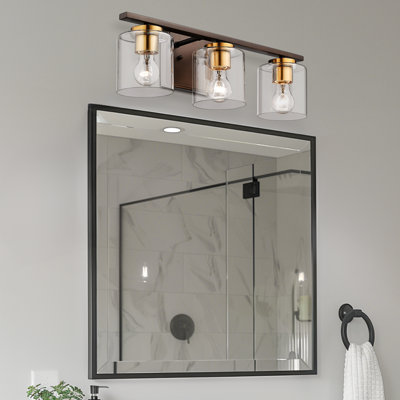 Éclairage pour meuble-lavabo de campagne 3 lumières avec abat-jour en verre transparent au fini bronze huilé et or