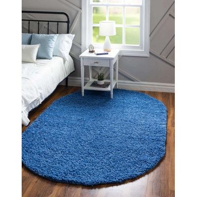 Tapis ovale rayé scintillant