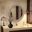 Miroir mural rond avec cadre sculpté