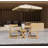 A foldable small outdoor leisure table and chair set with excellent materials includes 2 chairs and a rectangular table.