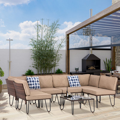 8 Piece Rattan Sectional Seating Group with Cushions