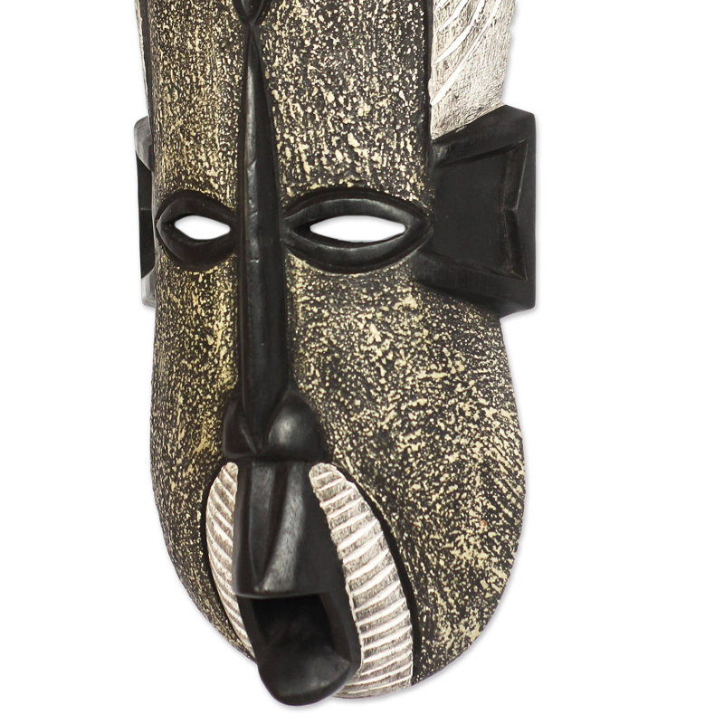 Décoration murale masque de bois africain «Mercorable Face»