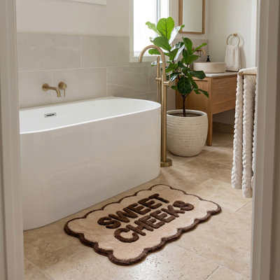 Sweet Cheeks Slogan Scalloped Bath Mat
