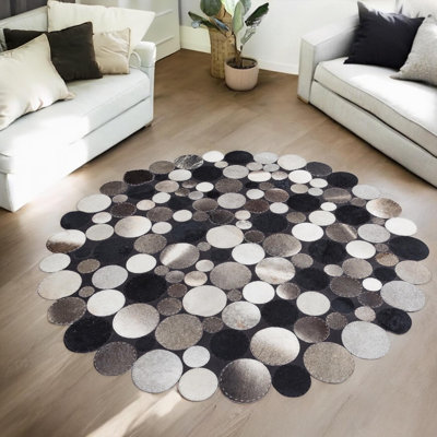 Tapis rond en cuir de vache noir et gris 7 pi