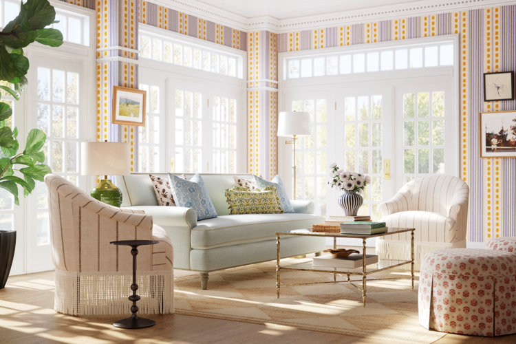 grandmacore living room with floral wallpaper, floral chairs, and a white upholstered sofa