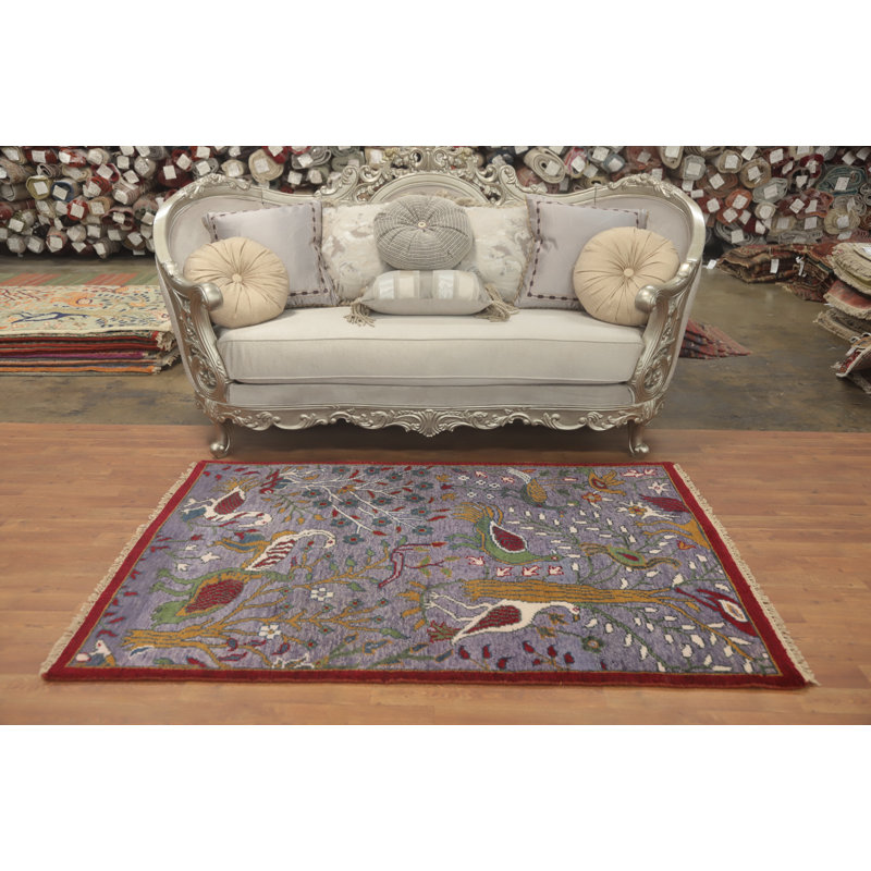 Tapis oriental mauve à motif animalier 4 x 6