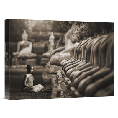 " Young Buddhist Monk Praying; Thailand "